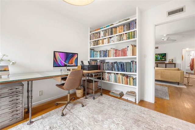 1642 W Woodcrest Ave, Fullerton, CA 92833 - office featuring wood finished floors and ceiling fan