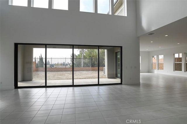 20552 Edgewood Ct, Chatsworth, CA 91311 - unfurnished living room featuring a high ceiling, tile patterned floors, and recessed lighting