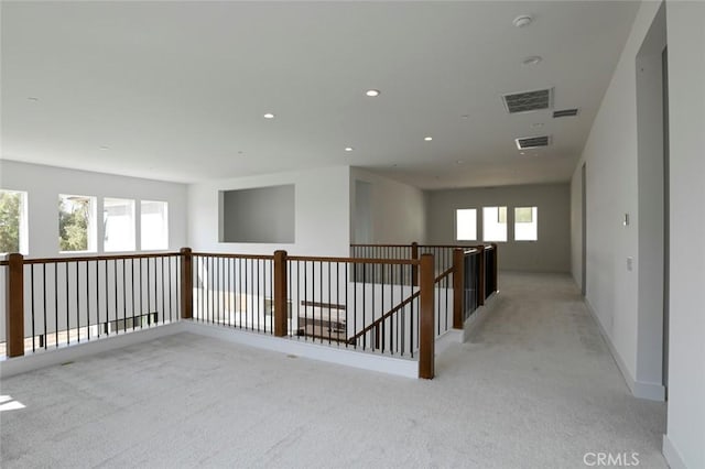 20552 Edgewood Ct, Chatsworth, CA 91311 - hallway featuring light carpet, recessed lighting, and an upstairs landing