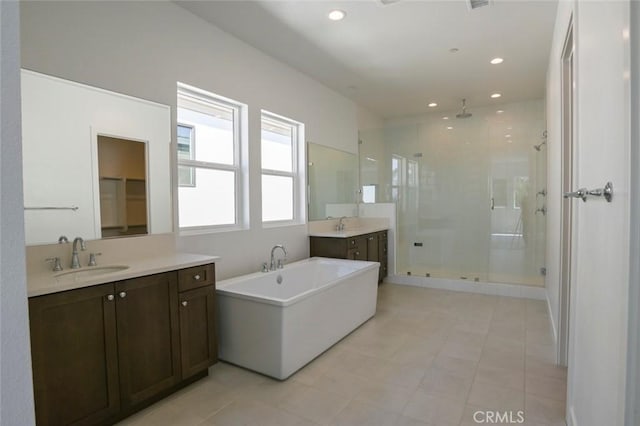 20552 Edgewood Ct, Chatsworth, CA 91311 - bathroom with a stall shower, two vanities, a freestanding bath, recessed lighting, and tile patterned floors