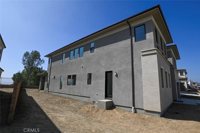 20552 Edgewood Ct, Chatsworth, CA 91311 - rear view of house featuring stucco siding