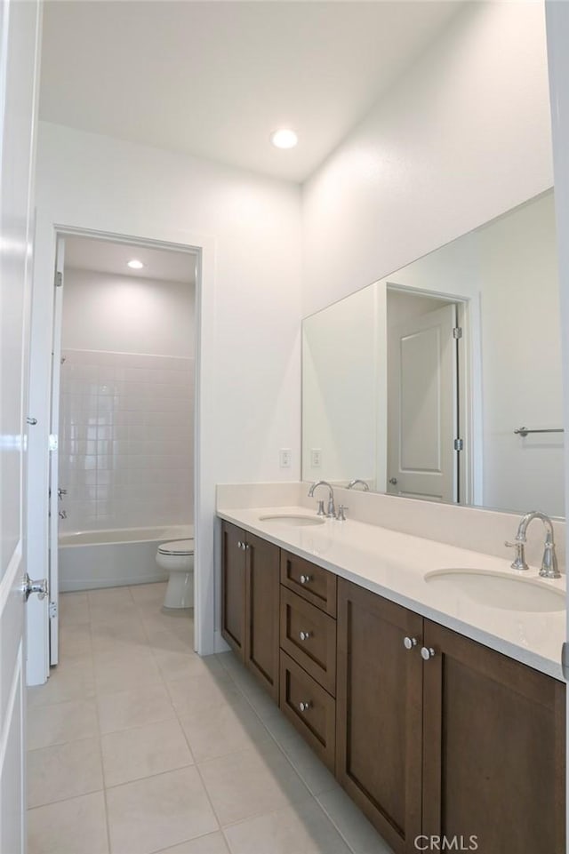 20552 Edgewood Ct, Chatsworth, CA 91311 - full bathroom with double vanity, tile patterned flooring, recessed lighting, and tub / shower combination