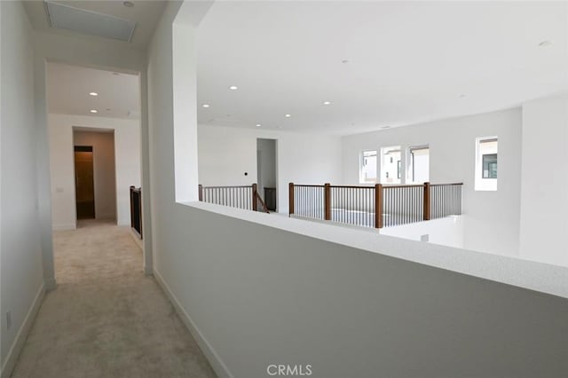 20552 Edgewood Ct, Chatsworth, CA 91311 - hall featuring light carpet, recessed lighting, and an upstairs landing