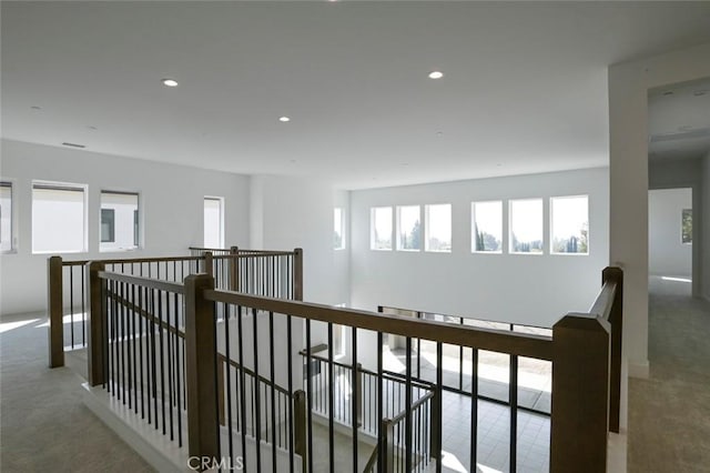 20552 Edgewood Ct, Chatsworth, CA 91311 - hall with an upstairs landing, carpet flooring, and recessed lighting