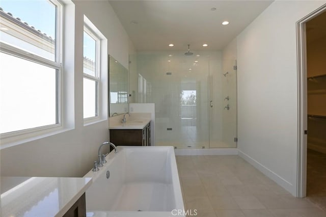 20552 Edgewood Ct, Chatsworth, CA 91311 - full bathroom featuring a stall shower, a bath, vanity, recessed lighting, and a walk in closet