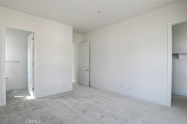 20552 Edgewood Ct, Chatsworth, CA 91311 - unfurnished bedroom with carpet floors, a closet, ensuite bathroom, and a spacious closet