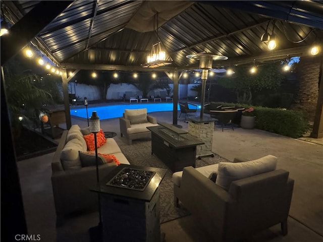 20322 Cantara St, Winnetka, CA 91306 - view of patio with an outdoor living space with a fire pit and an outdoor pool
