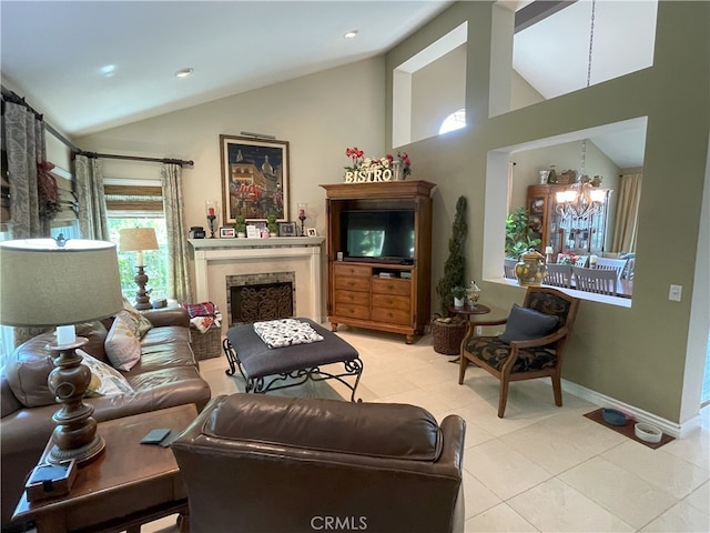 17 Thornbird, Aliso Viejo, CA 92656 - living room with vaulted ceiling, a chandelier, and a fireplace