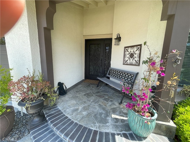 17 Thornbird, Aliso Viejo, CA 92656 - property entrance featuring stucco siding and covered porch