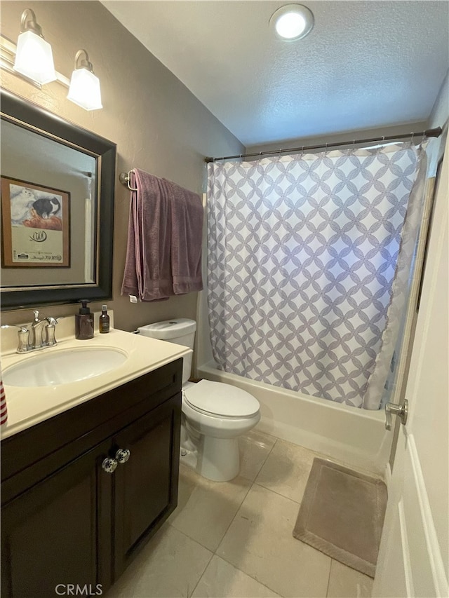 17 Thornbird, Aliso Viejo, CA 92656 - bathroom featuring shower / tub combo, vanity, a textured ceiling, and tile patterned flooring