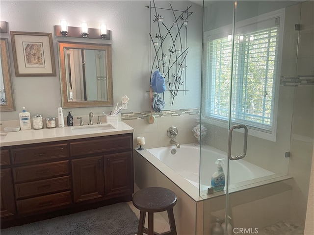 17 Thornbird, Aliso Viejo, CA 92656 - bathroom with vanity, a bath, and a shower stall