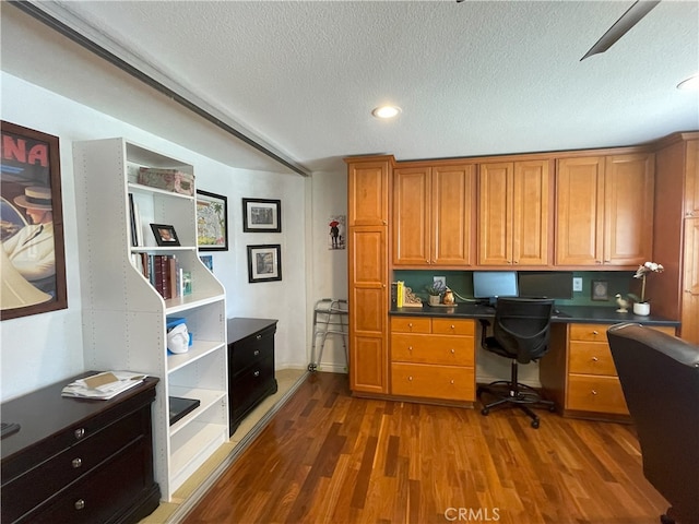 17 Thornbird, Aliso Viejo, CA 92656 - office space with built in study area, dark wood-style floors, a textured ceiling, recessed lighting, and ceiling fan