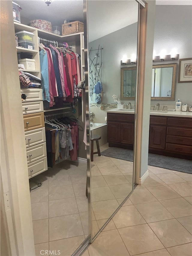 17 Thornbird, Aliso Viejo, CA 92656 - full bath with two vanities, tile patterned floors, and a spacious closet