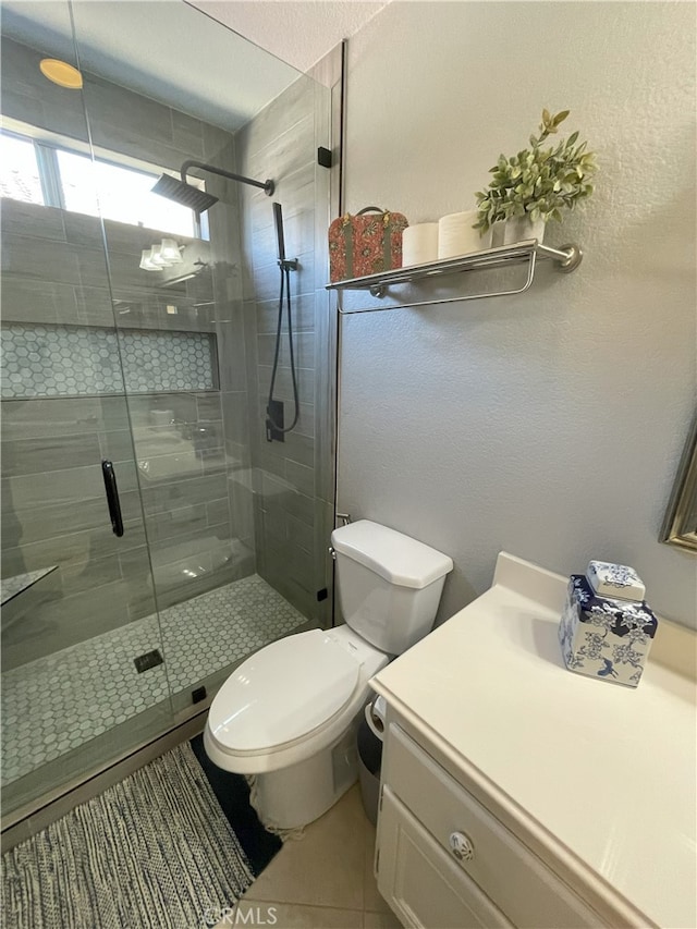 17 Thornbird, Aliso Viejo, CA 92656 - bathroom with vanity, a stall shower, and tile patterned flooring