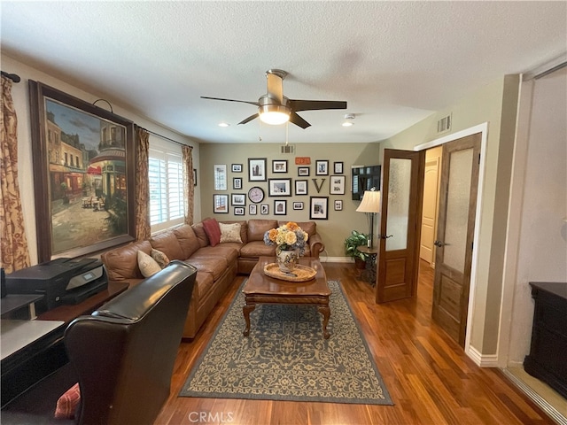 17 Thornbird, Aliso Viejo, CA 92656 - living area featuring a ceiling fan, wood finished floors, and a textured ceiling