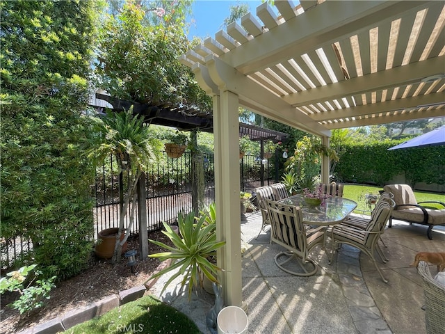 17 Thornbird, Aliso Viejo, CA 92656 - view of patio / terrace with outdoor dining space and a pergola