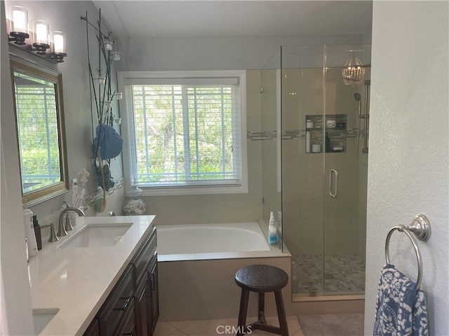 17 Thornbird, Aliso Viejo, CA 92656 - full bath with double vanity, a stall shower, a bath, and tile patterned floors