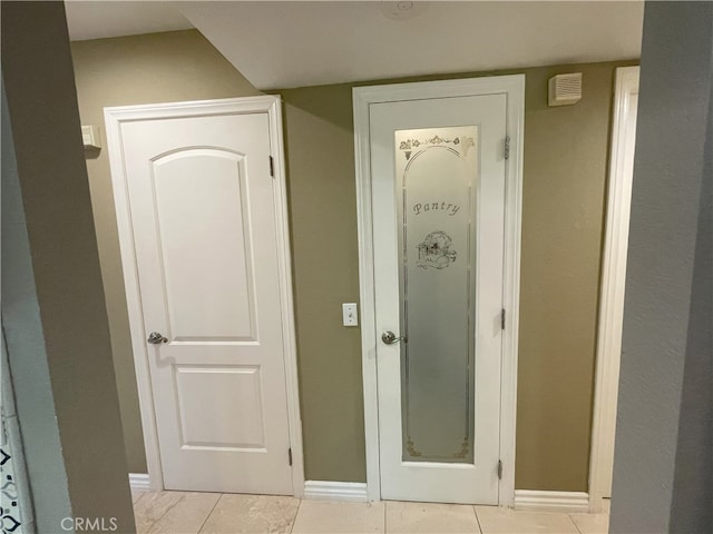 17 Thornbird, Aliso Viejo, CA 92656 - hall with light tile patterned floors and baseboards