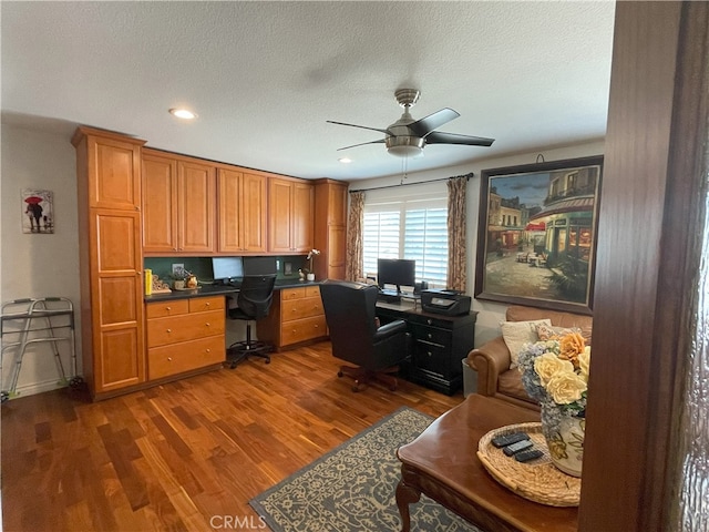 17 Thornbird, Aliso Viejo, CA 92656 - office with a ceiling fan, dark wood-style flooring, built in desk, recessed lighting, and a textured ceiling