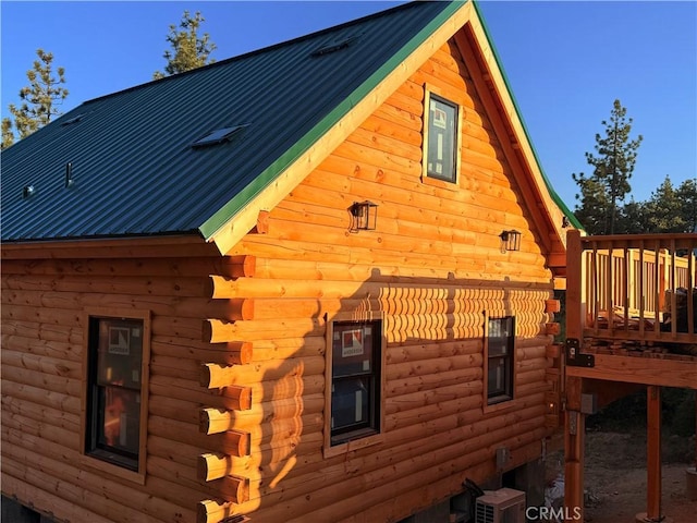 33149 Holcomb Creek Dr, Green Valley Lake, CA 92341 - view of side of home with log exterior, a metal roof, and a wooden deck