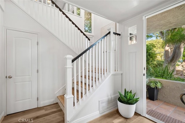 362 Vista Madera, Newport Beach, CA 92660 - stairway featuring healthy amount of natural light and wood finished floors