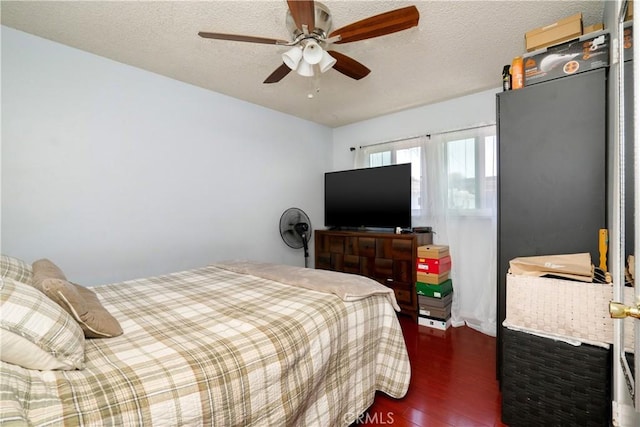4220 W 165th St, Lawndale, CA 90260 - bedroom with wood finished floors, ceiling fan, and a textured ceiling