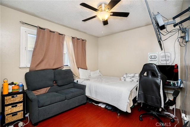 4220 W 165th St, Lawndale, CA 90260 - bedroom featuring wood finished floors, a textured ceiling, and a ceiling fan
