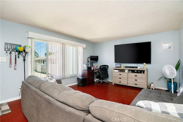 4220 W 165th St, Lawndale, CA 90260 - living room featuring wood finished floors, a textured ceiling, and a desk