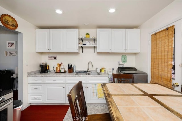 4220 W 165th St, Lawndale, CA 90260 - kitchen with tile countertops, white cabinetry, electric stove, open shelves, and recessed lighting