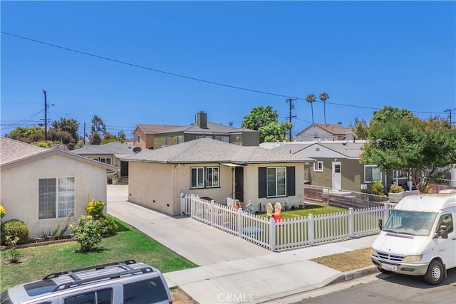 4220 W 165th St, Lawndale, CA 90260 - ranch-style home with stucco siding, a fenced front yard, and concrete driveway