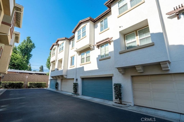 159 Principia Ct, Claremont, CA 91711 - view of building exterior featuring an attached garage
