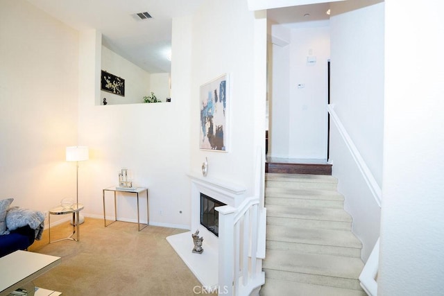 159 Principia Ct, Claremont, CA 91711 - stairs with carpet and a glass covered fireplace