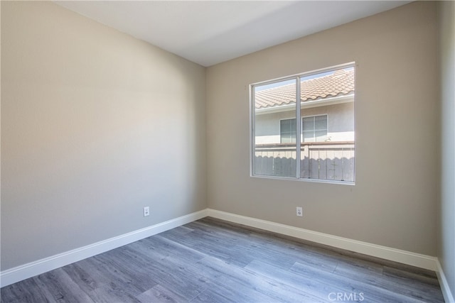 41808 Vardon Dr, Temecula, CA 92591 - empty room featuring wood finished floors and baseboards