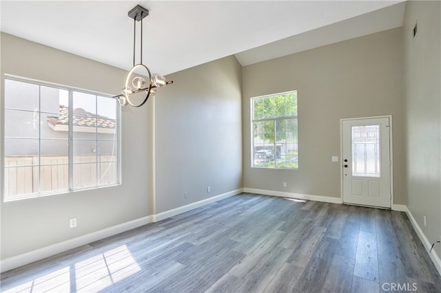 41808 Vardon Dr, Temecula, CA 92591 - unfurnished dining area with a chandelier and wood finished floors