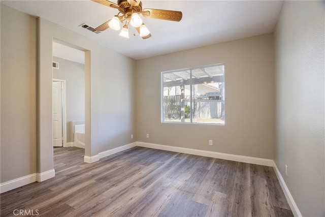 41808 Vardon Dr, Temecula, CA 92591 - spare room with wood finished floors and a ceiling fan