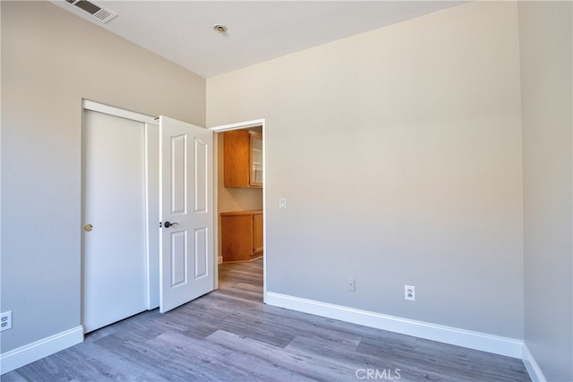 41808 Vardon Dr, Temecula, CA 92591 - unfurnished bedroom with wood finished floors and a closet