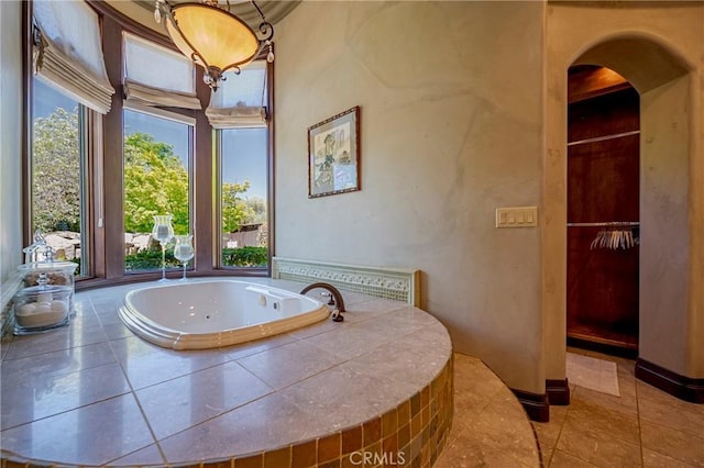 2882 Trovare Ct, Merced, CA 95340 - full bathroom with a whirlpool tub