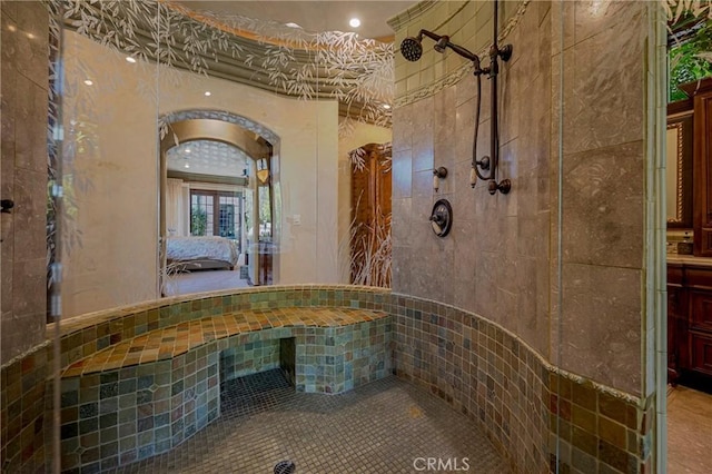2882 Trovare Ct, Merced, CA 95340 - ensuite bathroom with tiled shower, vanity, and recessed lighting