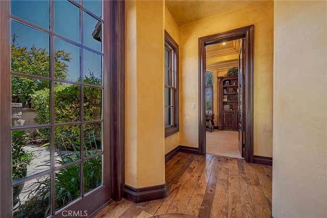 2882 Trovare Ct, Merced, CA 95340 - corridor featuring wood-type flooring and baseboards