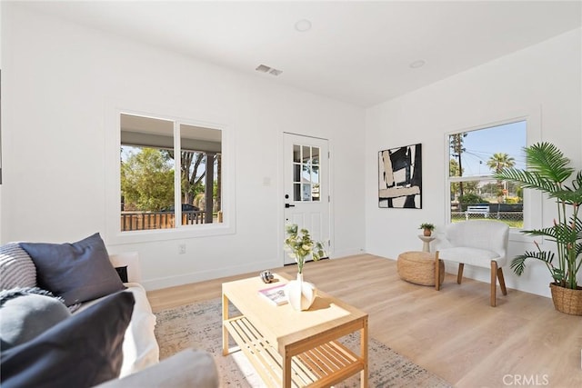 2158 10th St, Riverside, CA 92507 - living room with light wood-style floors and baseboards