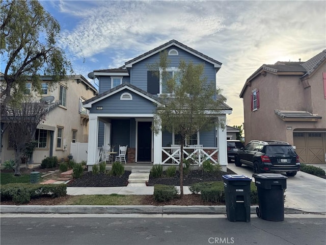 28451 Plymouth Way, Temecula, CA 92591 - traditional-style home with covered porch, a tiled roof, and driveway