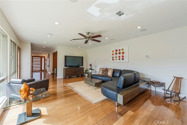 4510 S Mullen Ave, View Park, CA 90043 - living room featuring light wood finished floors, recessed lighting, and ceiling fan