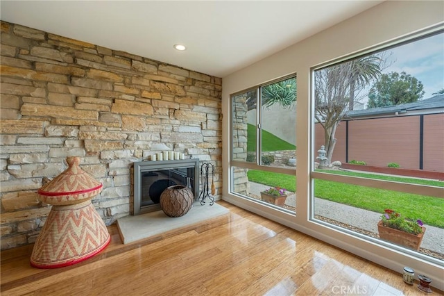 4510 S Mullen Ave, View Park, CA 90043 - unfurnished living room featuring wood finished floors, a fireplace, and recessed lighting