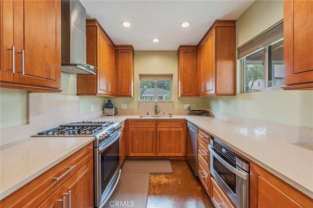 4510 S Mullen Ave, View Park, CA 90043 - kitchen featuring wall chimney range hood, appliances with stainless steel finishes, brown cabinets, recessed lighting, and light countertops