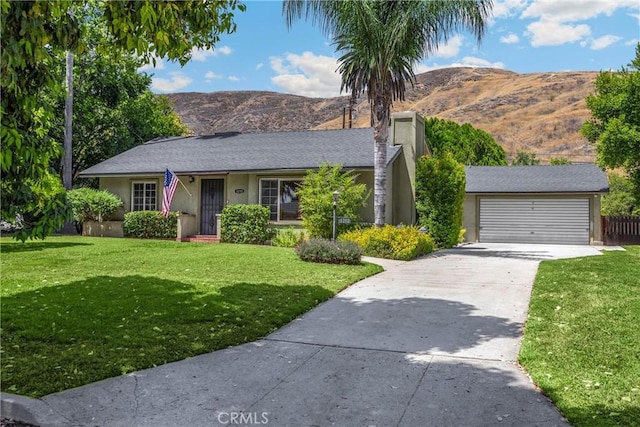 1210 W Marshall Blvd, San Bernardino, CA 92405 - ranch-style home featuring stucco siding, driveway, a mountain view, and a chimney