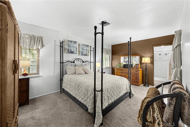 1210 W Marshall Blvd, San Bernardino, CA 92405 - bedroom with carpet flooring and baseboards