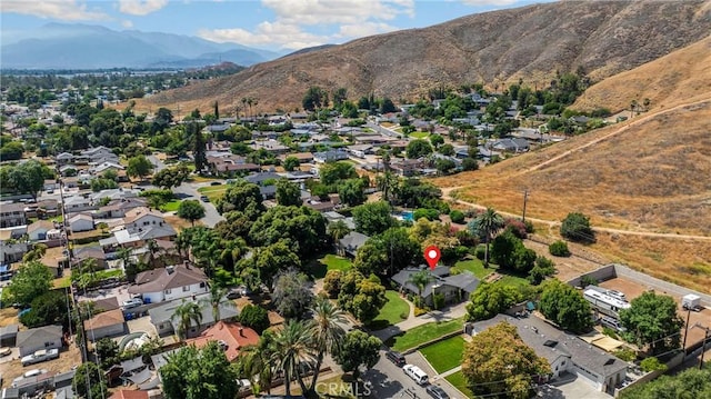 1210 W Marshall Blvd, San Bernardino, CA 92405 - aerial overview of property's location with a mountainous background and nearby suburban area