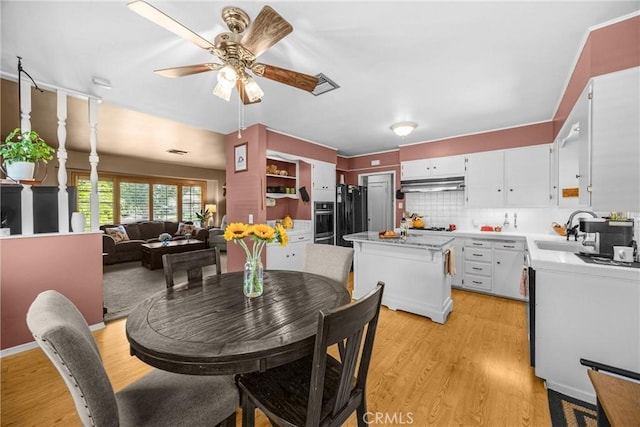 1210 W Marshall Blvd, San Bernardino, CA 92405 - dining space featuring ceiling fan and light wood finished floors