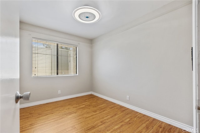 2621 E 20th St Unit 12, Signal Hill, CA 90755 - empty room featuring light wood-style flooring and baseboards