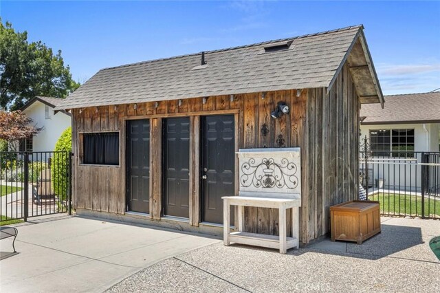 4742 Crow Rd, Oakdale, CA 95361 - back of house with roof with shingles and a patio area